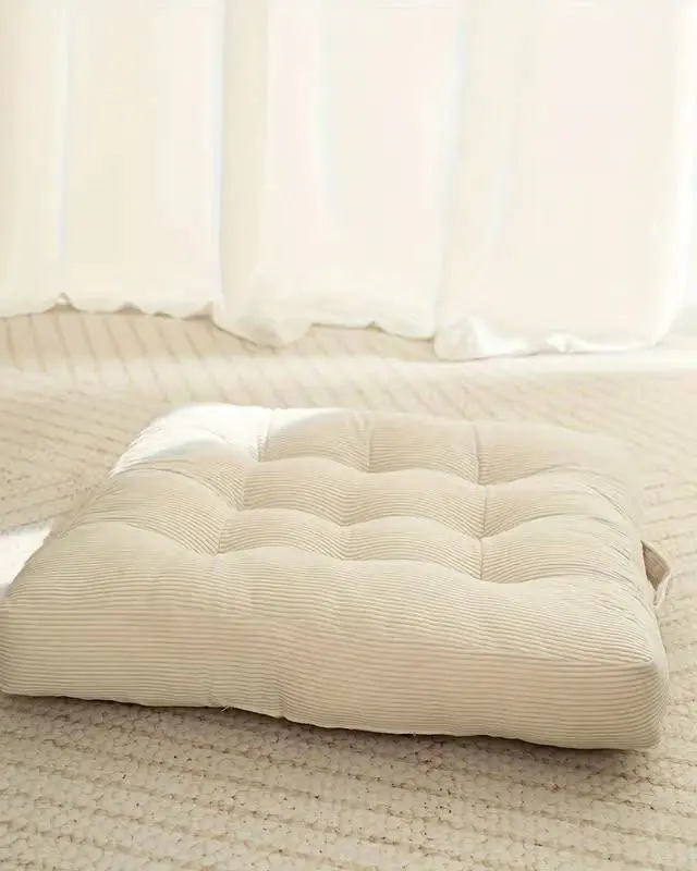Soft, plush corduroy seat cushions in white/cream that add comfort and style to venue-provided chairs. The corduroy texture adds visual interest, and the neutral tone works with any colour palette. Tie attachments secure them to most standard event chairs.