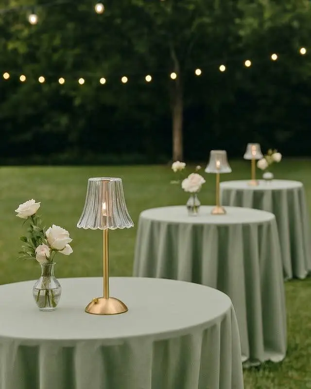 Warm, cordless LED table lamp that creates intimate ambiance without open flames. Ideal for venues with flame restrictions, tented events, and outdoor settings where wind is a factor.