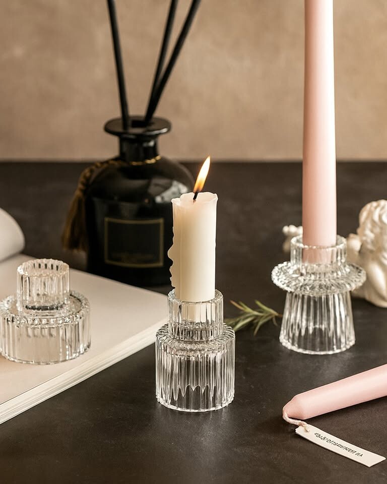 Simple, elegant clear glass candle holders suitable for tealights and votives. The minimalist design makes them endlessly versatile - use them across guest tables, at bar stations, along window ledges, or grouped on the head table for soft, ambient light.