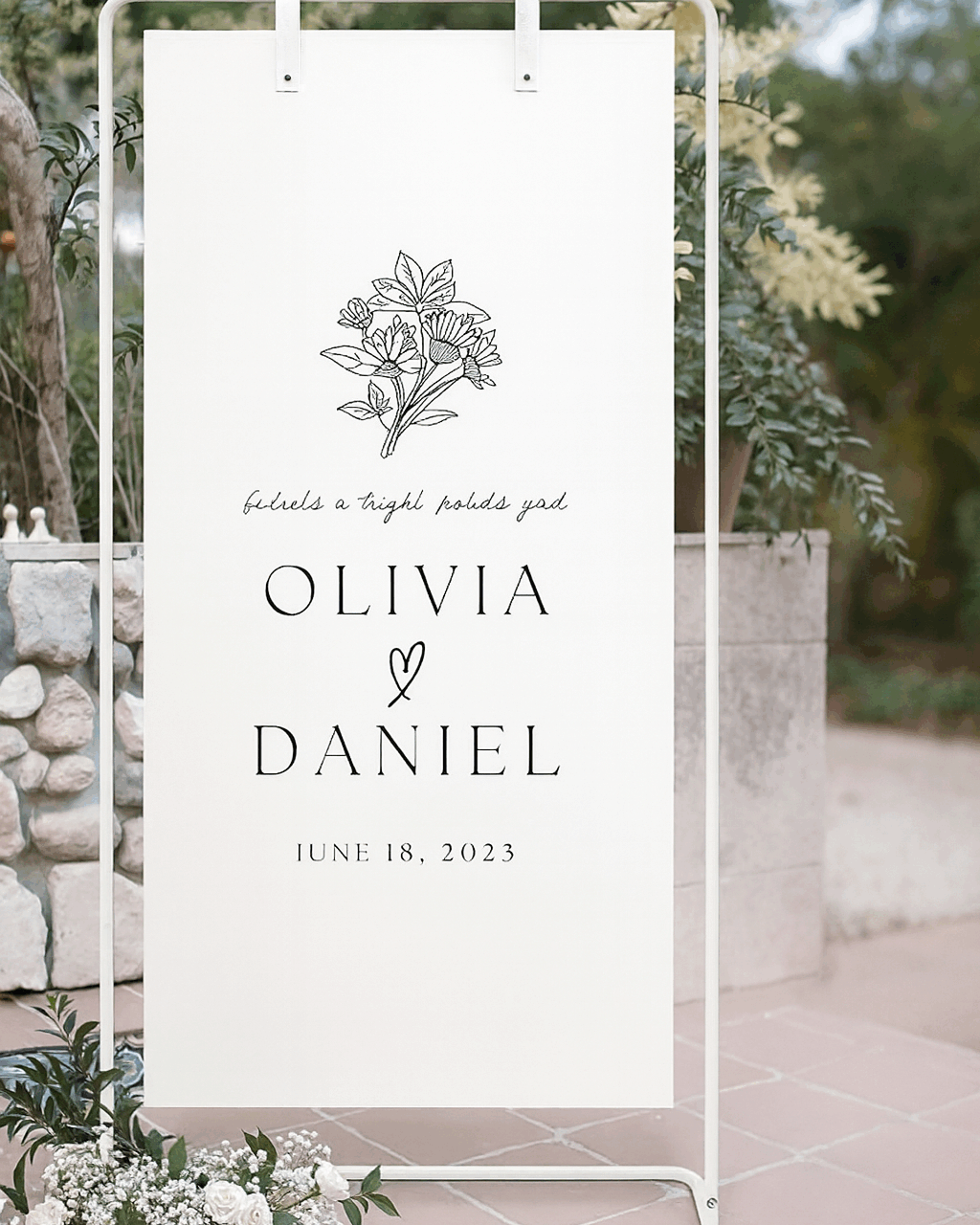 White metal hanging sign stand for displaying custom welcome signs, seating charts, menus, and other signage. The clean white finish complements any decor style. Accommodates signs up to 24 by 36 inches.