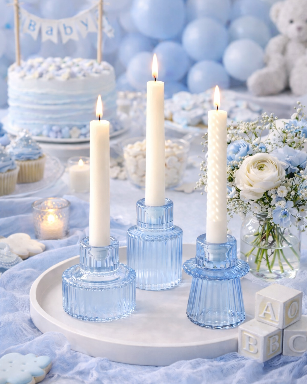 Cool blue glass candle holders that evoke coastal and lakeside vibes. Perfect for waterfront weddings at Okanagan and Vancouver venues. Pair with our blue mini bud vases for a coordinated ocean-inspired palette.
