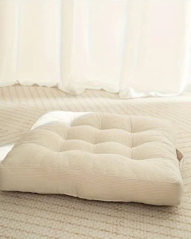 Soft, plush corduroy seat cushions in white/cream that add comfort and style to venue-provided chairs. The corduroy texture adds visual interest, and the neutral tone works with any colour palette. Tie attachments secure them to most standard event chairs.