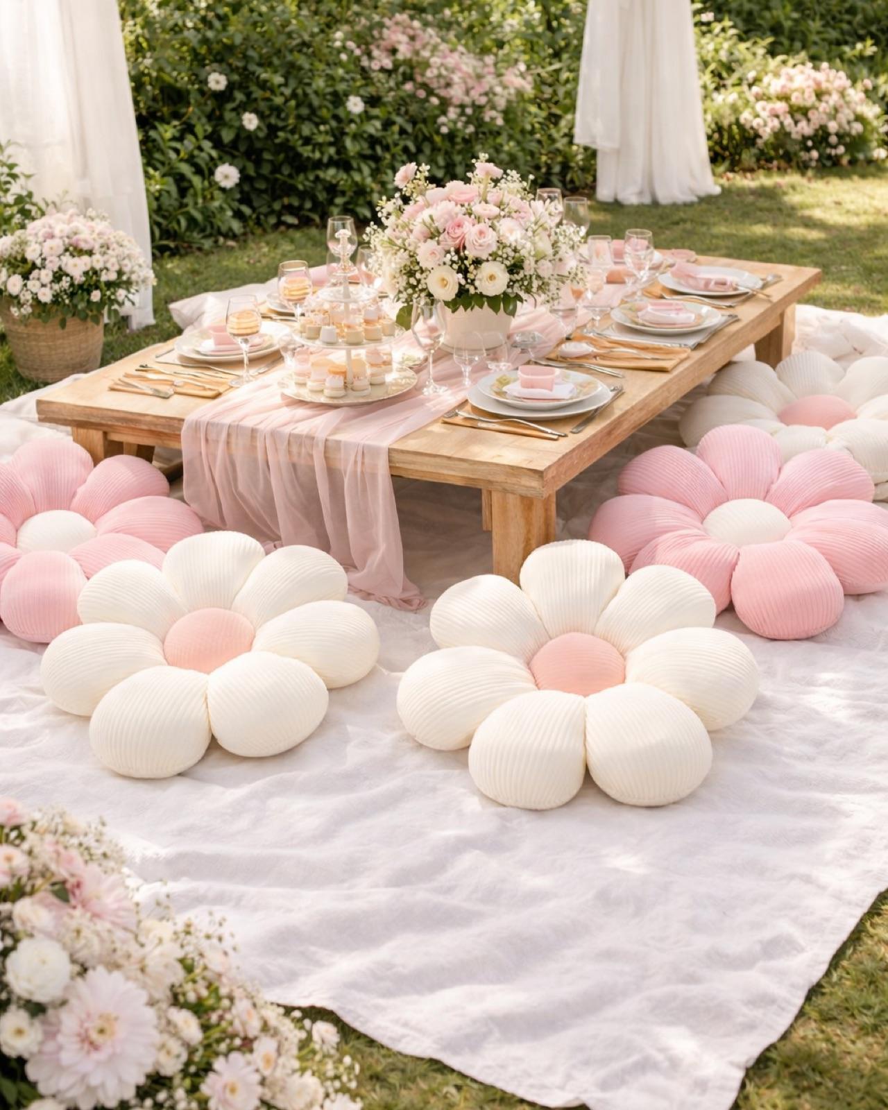 Set of two decorative pillows featuring pink and white floral designs. Add personality to lounge areas, ceremony seating, or styled vignettes. The floral pattern brings a romantic, garden-party feel to any space.